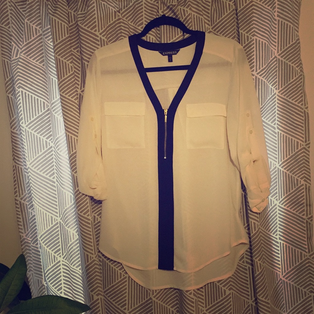 Cream Express blouse with black and gold accents